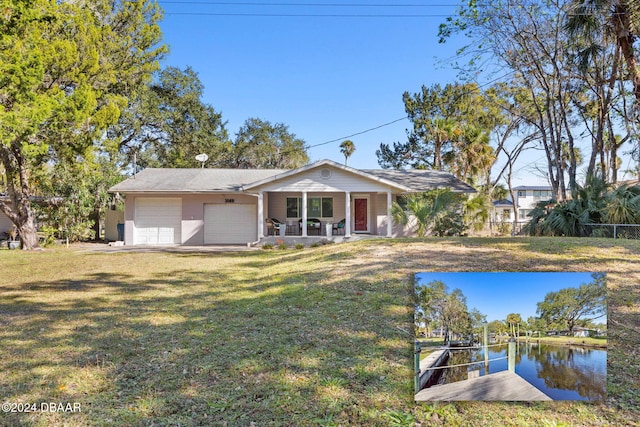 exterior space with a yard and a water view