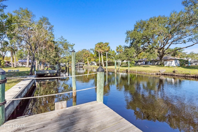 view of dock with a water view