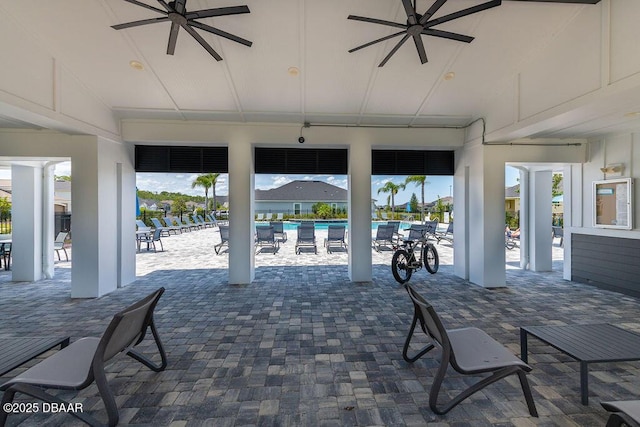 6294 W Fallsgrove Ln, Port Orange, FL 32128 - view of patio featuring ceiling fan and a community pool