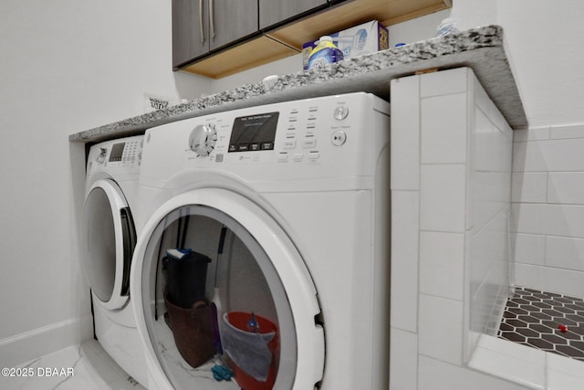 6294 W Fallsgrove Ln, Port Orange, FL 32128 - laundry room with separate washer and dryer and cabinet space