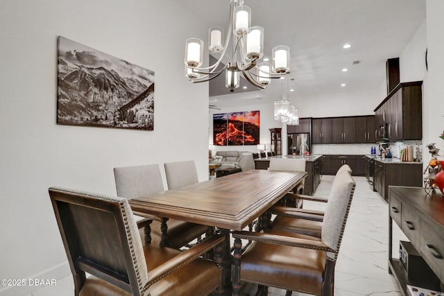 6294 W Fallsgrove Ln, Port Orange, FL 32128 - dining space featuring a chandelier, light marble finish flooring, and recessed lighting