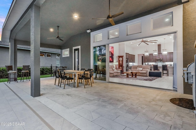 6294 W Fallsgrove Ln, Port Orange, FL 32128 - view of patio / terrace with ceiling fan, outdoor dining space, and an outdoor living space