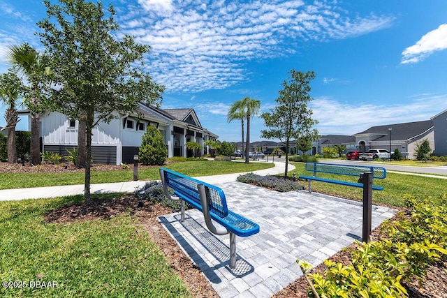 6294 W Fallsgrove Ln, Port Orange, FL 32128 - view of home's community with a residential view and a yard