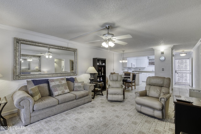 329 Wilder Blvd Unit C103, Daytona Beach, FL 32114 - living area featuring a ceiling fan, crown molding, and a textured ceiling