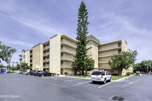 329 Wilder Blvd Unit C103, Daytona Beach, FL 32114 - view of apartment building / complex with uncovered parking