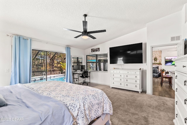 bedroom featuring carpet floors, visible vents, a ceiling fan, vaulted ceiling, and access to outside