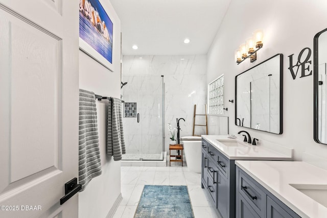 full bathroom with a marble finish shower, a sink, marble finish floor, two vanities, and recessed lighting