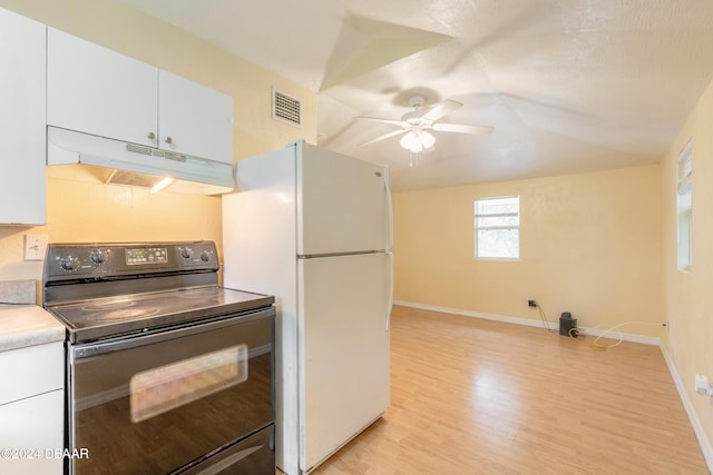 kitchen featuring white fridge, white cabinetry, light wood-type flooring, black range with electric stovetop, and ceiling fan