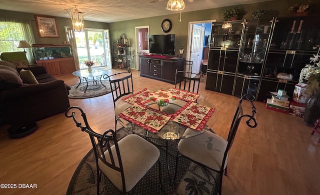 dining area featuring wood-type flooring