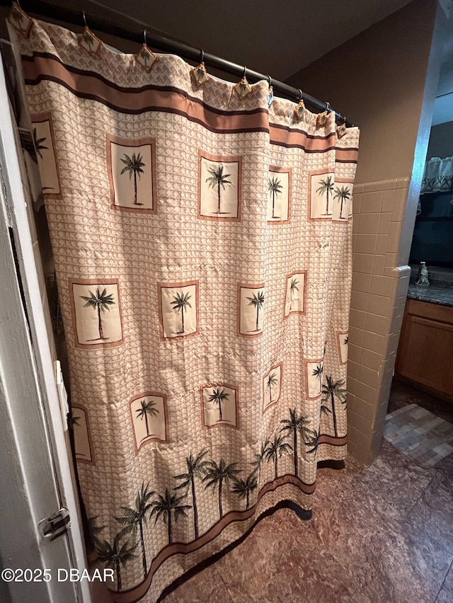 bathroom featuring curtained shower