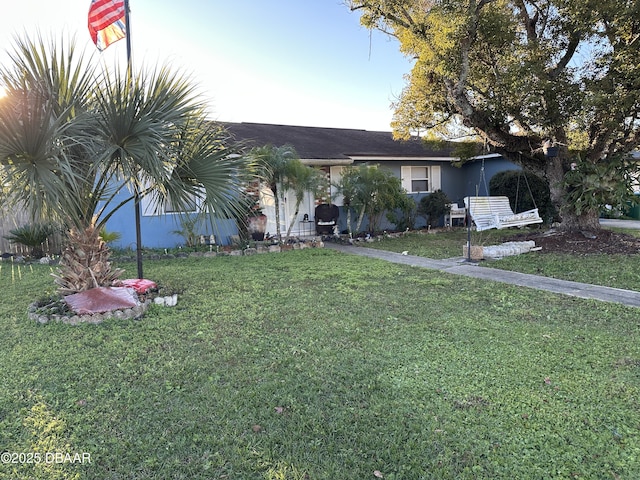 view of front facade with a front lawn