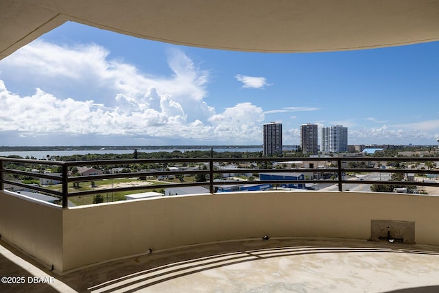 balcony featuring a water view