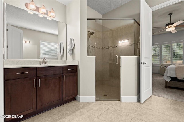 bathroom featuring a shower with door, tile patterned floors, ceiling fan, and lofted ceiling