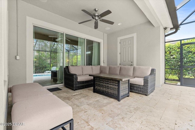 view of patio featuring ceiling fan, a lanai, and an outdoor hangout area