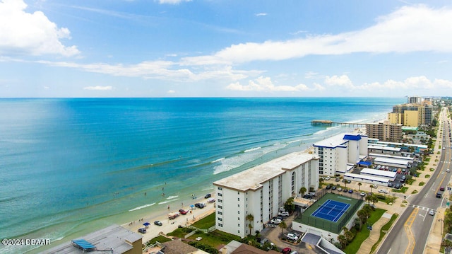 aerial view featuring a water view and a view of the beach