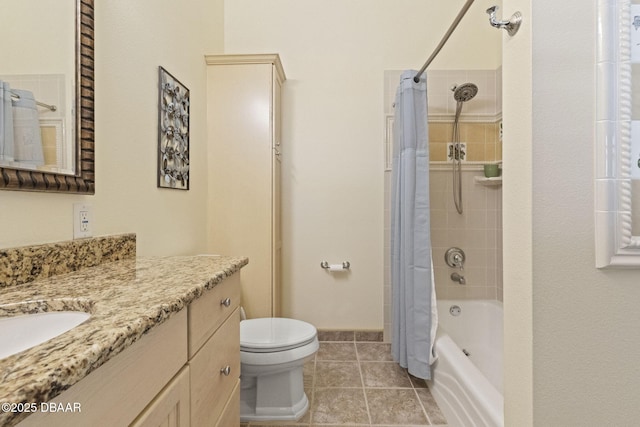 4210 S Peninsula Dr, Port Orange, FL 32127 - full bath featuring vanity, toilet, shower / bath combination with curtain, tile patterned floors, and baseboards