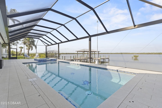 4210 S Peninsula Dr, Port Orange, FL 32127 - view of swimming pool featuring a pool with connected hot tub, a water view, a lanai, and a patio area