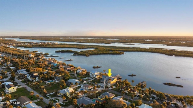 4210 S Peninsula Dr, Port Orange, FL 32127 - aerial overview of property's location with a large body of water and nearby suburban area