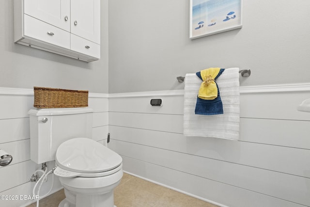 4210 S Peninsula Dr, Port Orange, FL 32127 - half bath with toilet and wainscoting