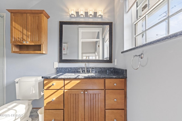 4210 S Peninsula Dr, Port Orange, FL 32127 - bathroom featuring vanity and toilet