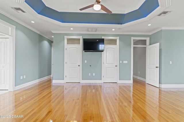 4210 S Peninsula Dr, Port Orange, FL 32127 - unfurnished bedroom with ornamental molding, light wood-type flooring, recessed lighting, a raised ceiling, and baseboards