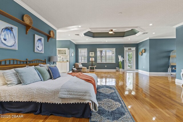 4210 S Peninsula Dr, Port Orange, FL 32127 - bedroom with ornamental molding, a textured ceiling, wood finished floors, baseboards, and recessed lighting