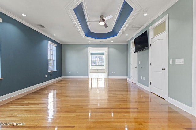 4210 S Peninsula Dr, Port Orange, FL 32127 - unfurnished room featuring ceiling fan, healthy amount of natural light, ornamental molding, light wood finished floors, and baseboards