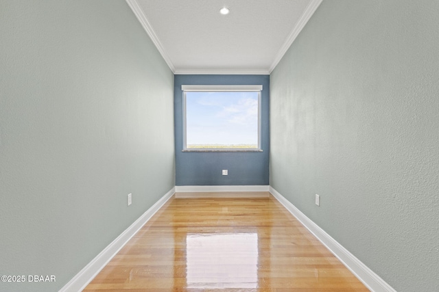4210 S Peninsula Dr, Port Orange, FL 32127 - unfurnished room featuring ornamental molding, light wood-type flooring, and baseboards