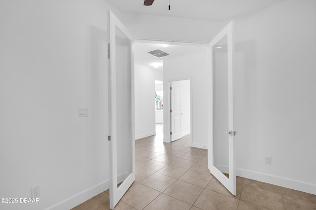 623 Margaritaville Ave, Daytona Beach, FL 32124 - hall featuring light tile patterned floors and baseboards