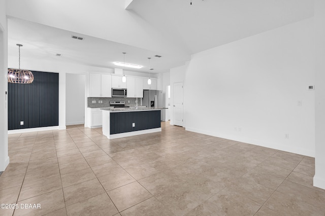 623 Margaritaville Ave, Daytona Beach, FL 32124 - unfurnished living room featuring a chandelier and light tile patterned floors