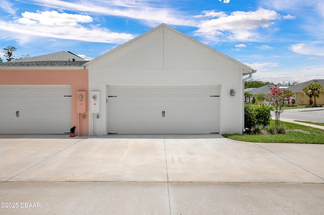 623 Margaritaville Ave, Daytona Beach, FL 32124 - garage featuring driveway