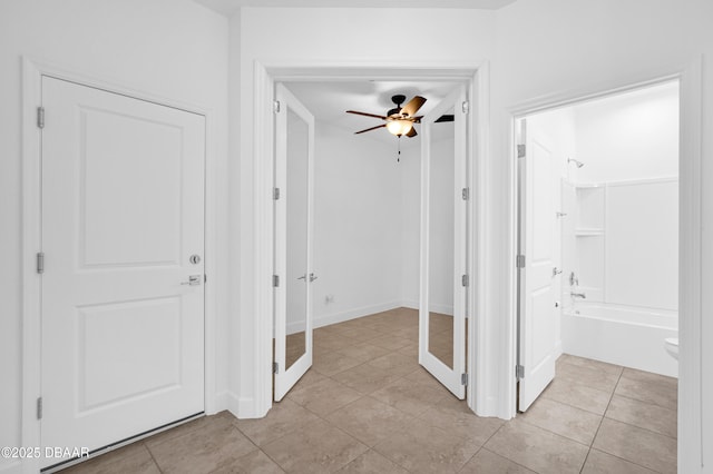 623 Margaritaville Ave, Daytona Beach, FL 32124 - hall featuring light tile patterned flooring