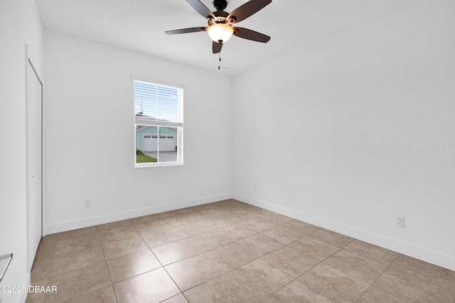 623 Margaritaville Ave, Daytona Beach, FL 32124 - tiled empty room featuring a ceiling fan and baseboards