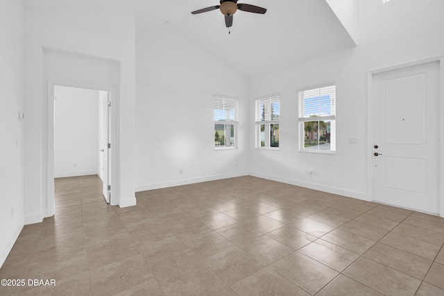 623 Margaritaville Ave, Daytona Beach, FL 32124 - spare room featuring high vaulted ceiling, ceiling fan, and light tile patterned floors