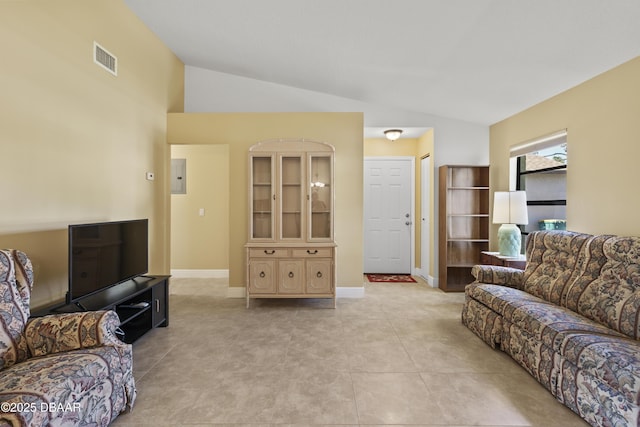 living room with electric panel, light tile patterned floors, and lofted ceiling