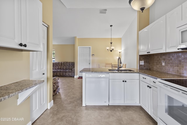 kitchen featuring white cabinetry, sink, hanging light fixtures, kitchen peninsula, and white appliances