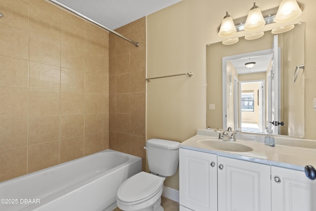 full bathroom featuring vanity, toilet, and tiled shower / bath