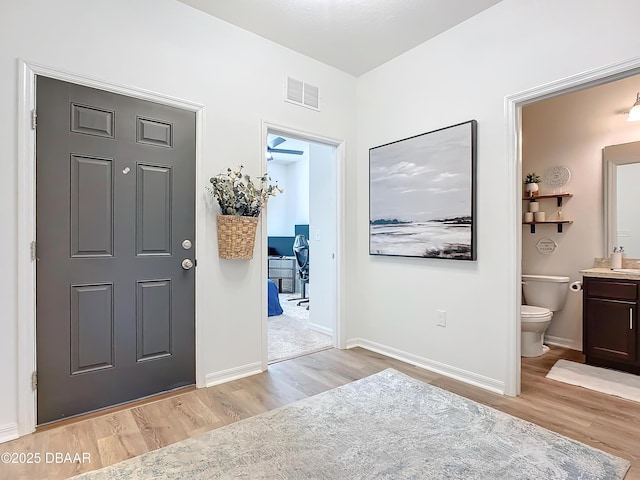 foyer entrance featuring light hardwood / wood-style flooring