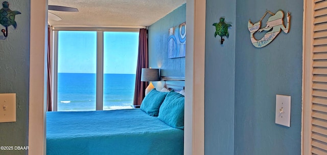 bedroom featuring a textured ceiling