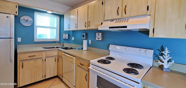 kitchen featuring under cabinet range hood, white appliances, and light brown cabinets