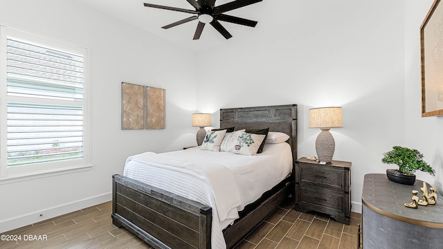 bedroom featuring ceiling fan and hardwood / wood-style floors