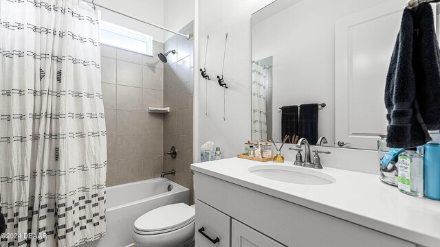 full bathroom with vanity, toilet, and shower / bathtub combination with curtain