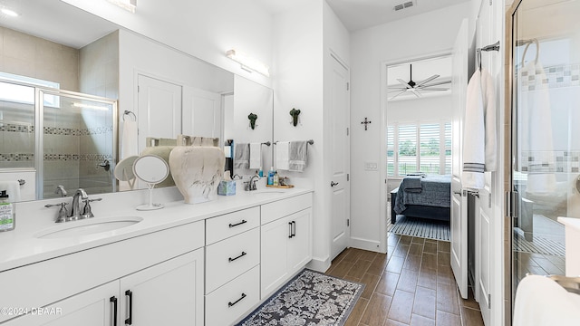 bathroom with vanity and an enclosed shower