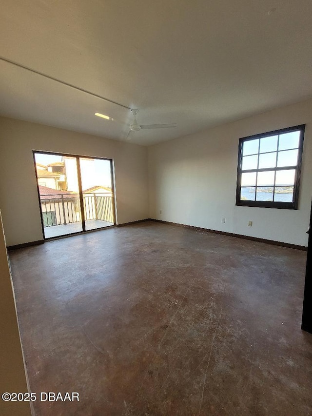 spare room featuring ceiling fan