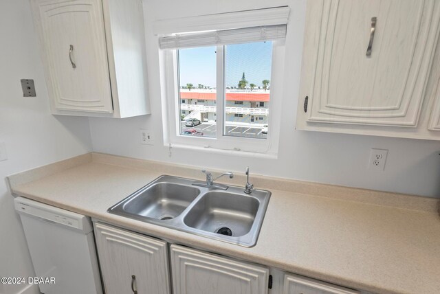 kitchen with sink and white dishwasher