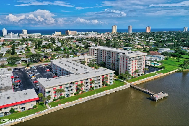 drone / aerial view with a water view