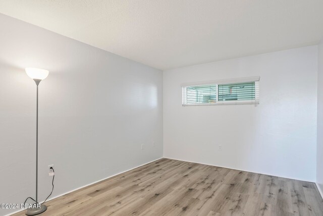 empty room featuring light hardwood / wood-style floors