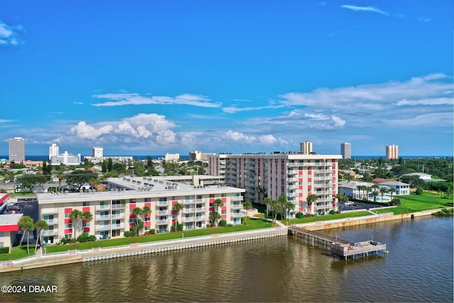 birds eye view of property featuring a water view