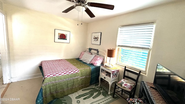 bedroom featuring ceiling fan