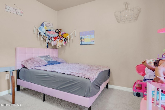 bedroom featuring baseboards and carpet flooring